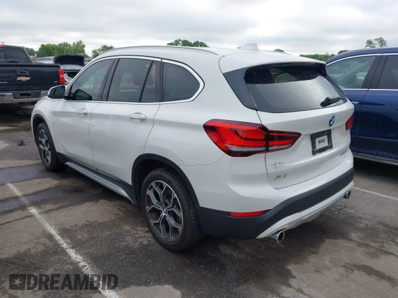 2021 BMW X1 xDrive28i with VIN WBXJG9C01M5S06181, listed as a IAAI auction lot 42292167 with 55,966 mi miles and . Bid and sale history available at DreamBid. Image 3.
