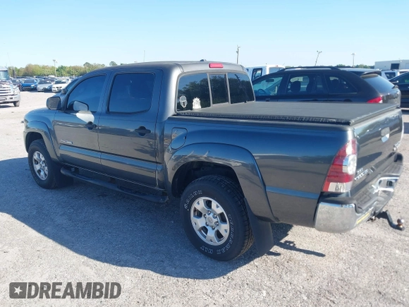 2009 Toyota Tacoma PreRunner with VIN 3TMJU62N59M088137, listed as a IAAI auction lot 41775410 with 217,331 mi miles. Bid and sale history available at carsss.com. Image 3.