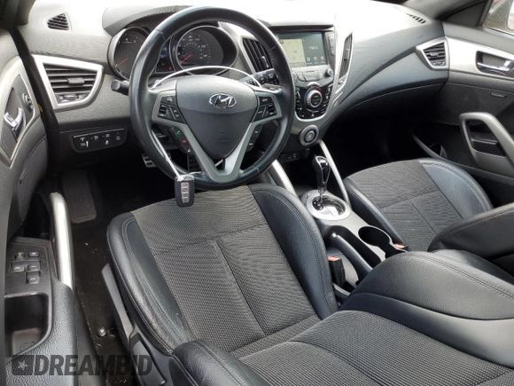 2016 Hyundai Veloster z VIN KMHTC6AD4GU294400, wystawiony jako Copart lot #52755575 z przebiegiem 108 419 mil mil oraz Szkoda całkowita • Salvage title. Historia ofert i sprzedaży dostępna na DreamBid. Obrazek 8.
