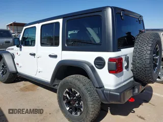 2025 Jeep Wrangler Rubicon with VIN 1C4PJXFN8SW527131, listed as a IAAI auction lot 41502676 with 1,051 mi miles and . Bid and sale history available at DreamBid. Image 3.