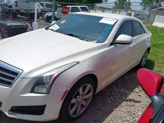 2013 Cadillac ATS with VIN 1G6AA5RA1D0139105, listed as a IAAI auction lot 42264614 with 69,049 mi miles and . Bid and sale history available at DreamBid. Image 2.