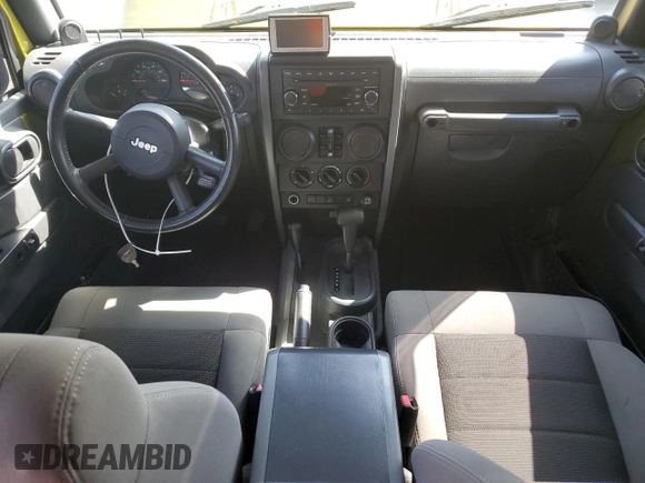 2008 Jeep Wrangler Unlimited X with VIN 1J4GA39118L528479, listed as a Copart auction lot 50953825 with 171,156 mi miles and Salvage Title. Bid and sale history available at carsss.com. Image 8.