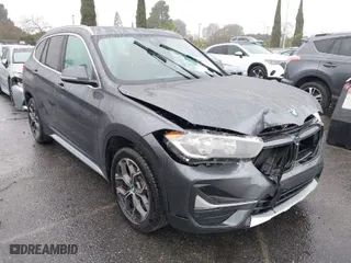 2020 BMW X1 sDrive28i with VIN WBXJG7C05L5R44276, listed as a IAAI auction lot 41567237 with 22,148 mi miles. Bid and sale history available at carsss.com. Image 1.