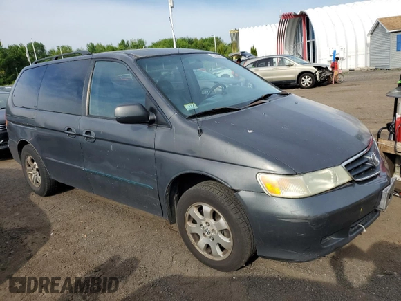 2004 Honda Odyssey EX-RES z VIN 5FNRL188X4B115002, wystawiony jako Copart lot #57883945 z przebiegiem Nie podano mil oraz Szkoda całkowita • Salvage title. Historia ofert i sprzedaży dostępna na DreamBid. Obrazek 4.
