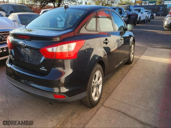 2014 Ford Focus SE with VIN 1FADP3F25EL425281, listed as a IAAI auction lot 41968193 with 112,614 mi miles. Bid and sale history available at carsss.com. Image 4.