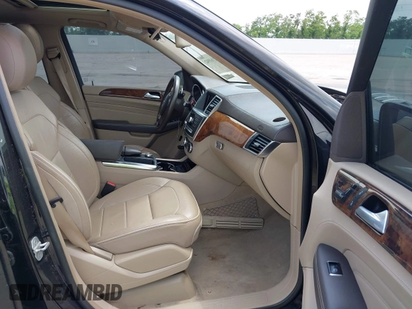 2014 Mercedes-Benz M ML 550 with VIN 4JGDA7DBXEA291980, listed as a IAAI auction lot 42161942 with 121,341 mi miles. Bid and sale history available at carsss.com. Image 5.