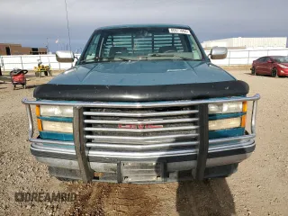 1994 GMC Sierra 1500 with VIN 1GTEK14K5RE539652, listed as a Copart auction lot 80877094 with 162,533 mi miles and Salvage Title. Bid and sale history available at DreamBid. Image 5.