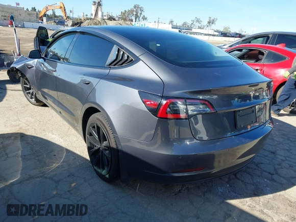 2022 Tesla Model 3 with VIN 5YJ3E1EA3NF165054, listed as a IAAI auction lot 41805729 with 225,773 mi miles. Bid and sale history available at carsss.com. Image 3.