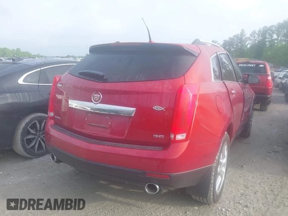 2014 Cadillac SRX Premium Collection with VIN 3GYFNDE36ES564140, listed as a IAAI auction lot 42070008 with 69,768 mi miles and . Bid and sale history available at DreamBid. Image 4.