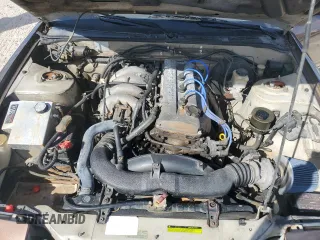 1991 Nissan 240SX z VIN JN1MS34PXMW001053, wystawiony jako Copart lot #79007744 z przebiegiem 172 425 mil mil oraz Nie do naprawy. Historia ofert i sprzedaży dostępna na DreamBid. Obrazek 11.
