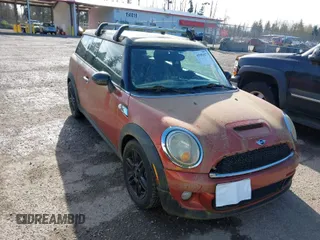 2012 MINI Clubman S z VIN WMWZG3C5XCTY39097, wystawiony jako IAAI lot #41945427 z przebiegiem 78 137 mil mil oraz . Historia ofert i sprzedaży dostępna na DreamBid. Obrazek 1.