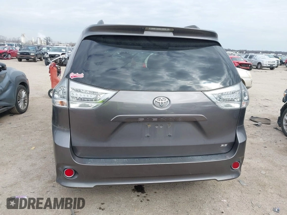 2015 Toyota Sienna SE with VIN 5TDXK3DC8FS652966, listed as a IAAI auction lot 41576611 with 108,858 mi miles and . Bid and sale history available at DreamBid. Image 16.