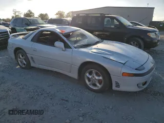 1993 Mitsubishi 3000GT z VIN JA3BM64J4PY006154, wystawiony jako Copart lot #76087934 z przebiegiem 135 641 mil mil oraz Szkody całkowita. Historia ofert i sprzedaży dostępna na DreamBid. Obrazek 4.