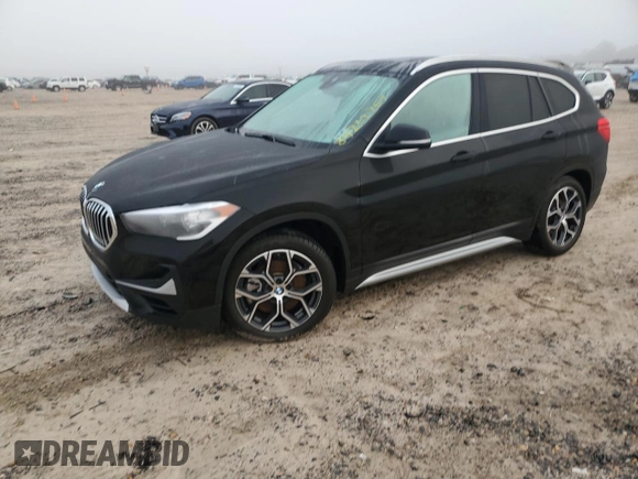 2021 BMW X1 xDrive28i with VIN WBXJG9C07M5T06155, listed as a Copart auction lot 84222754 with 18,466 mi miles and Salvage Title. Bid and sale history available at carsss.com. Image 1.