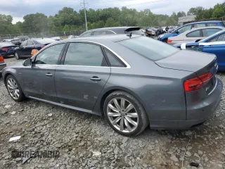 2016 Audi A8 L 4.0T Sport with VIN WAU43AFD0GN010739, listed as a Copart auction lot 63829554 with 201,213 mi miles and Salvage Title. Bid and sale history available at carsss.com. Image 2.
