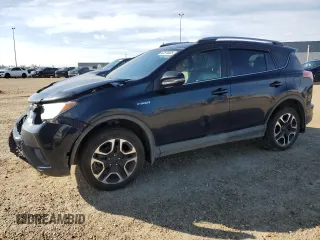 2018 Toyota RAV4 Hybrid SE with VIN JTMJJREV2JD230126, listed as a Copart auction lot 62574005 with 196,846 mi miles and Salvage title. Bid and sale history available at DreamBid. Image 1.