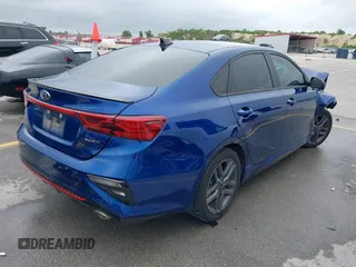 2021 Kia Forte GT-Line with VIN 3KPF34AD3ME403218, listed as a IAAI auction lot 42375319 with 56,621 mi miles and . Bid and sale history available at DreamBid. Image 4.