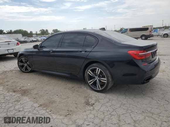 2018 BMW 7 Series 750i with VIN WBA7F0C58JGM23743, listed as a Copart auction lot 63465144 with 44,580 mi miles and Salvage Title. Bid and sale history available at carsss.com. Image 2.
