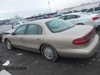 1997 Lincoln Continental with VIN 1LNLM97V3VY666104, listed as a IAAI auction lot 41650904 with 181,536 mi miles. Bid and sale history available at carsss.com. Image 14.