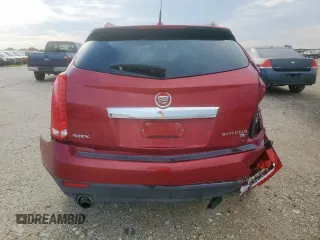 2012 Cadillac SRX Performance Collection z VIN 3GYFNBE31CS516837, wystawiony jako Copart lot #58346225 z przebiegiem 142 559 mil mil oraz Szkoda całkowita • Salvage title. Historia ofert i sprzedaży dostępna na DreamBid. Obrazek 6.