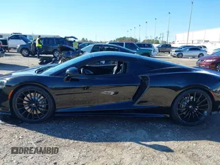 2020 McLaren GT with VIN SBM22GCA1LW000498, listed as a IAAI auction lot 41265247 with 18,465 mi miles. Bid and sale history available at carsss.com. Image 15.