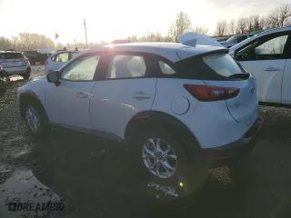 2016 Mazda CX-3 Touring with VIN JM1DKBC7XG0110631, listed as a Copart auction lot 82221324 with 20,922 mi miles and Salvage Title. Bid and sale history available at carsss.com. Image 2.