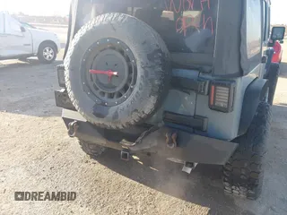 2015 Jeep Wrangler Unlimited Sport с VIN 1C4BJWDG6FL774275, выставлен на аукционе IAAI как лот 41984611 с пробегом 113 726 миль миль и . История ставок и продаж доступна на DreamBid. Изображение 6.