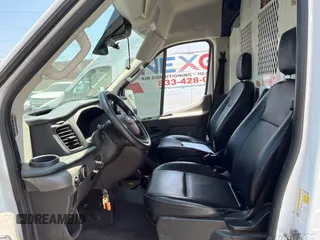 2021 Ford Transit Cargo with VIN 1FTYE1C87MKA94593, listed as a IAAI auction lot 42658954 with 99,425 mi miles and . Bid and sale history available at DreamBid. Image 14.
