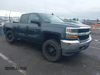 2018 Chevrolet Silverado 1500 LT with VIN 1GCVKREH7JZ268186, listed as a IAAI auction lot 41484090 with 153,392 mi miles and . Bid and sale history available at DreamBid. Image 1.