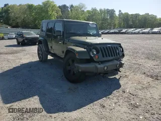 2008 Jeep Wrangler Unlimited Sahara with VIN 1J4GA59148L504608, listed as a Copart auction lot 52400325 with 123,959 mi miles and Salvage Title. Bid and sale history available at carsss.com. Image 11.