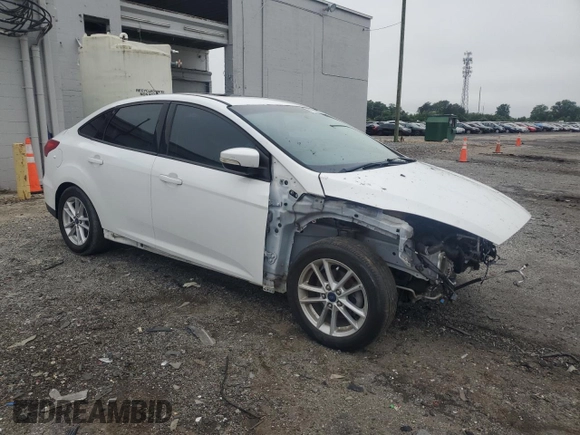2015 Ford Focus SE with VIN 1FADP3F2XFL273662, listed as a Copart auction lot 60784435 with 32,115 mi miles and Salvage title. Bid and sale history available at DreamBid. Image 4.