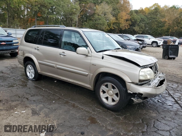2002 Suzuki XL7 Standard z VIN JS3TY92V524101048, wystawiony jako Copart lot #77658264 z przebiegiem 226 279 mil mil oraz Szkoda całkowita • Salvage title. Historia ofert i sprzedaży dostępna na DreamBid. Obrazek 4.
