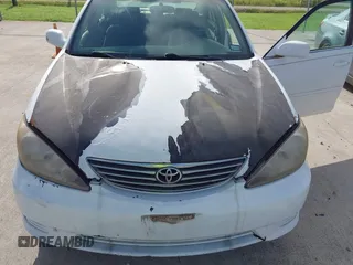 2005 Toyota Camry LE z VIN 4T1BE30K65U568049, wystawiony jako IAAI lot #42453538 z przebiegiem 182 375 mil mil oraz . Historia ofert i sprzedaży dostępna na DreamBid. Obrazek 6.