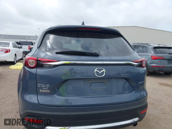 2023 Mazda CX-9 Carbon Edition with VIN JM3TCBDY6P0650808, listed as a IAAI auction lot 41965934 with 62,874 mi miles and . Bid and sale history available at carsss.com. Image 17.