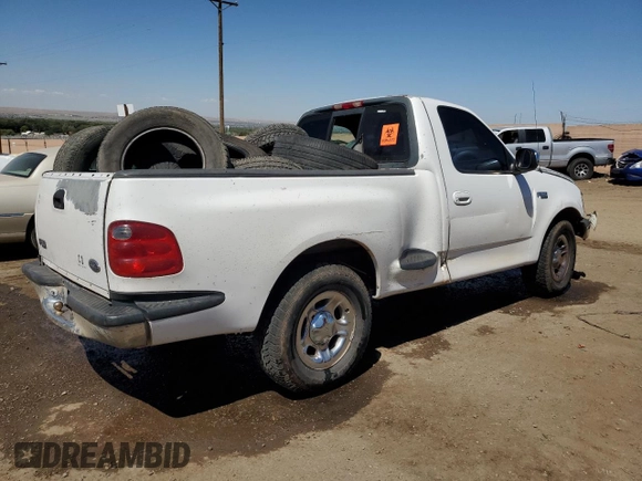 2000 Ford F-150 XL with VIN 1FTZF0727YKA84301, listed as a Copart auction lot 71593544 with 0 mi miles and Salvage Title. Bid and sale history available at carsss.com. Image 3.