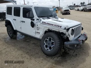 2023 Jeep Wrangler Rubicon with VIN 1C4HJXFG3PW691724, listed as a Copart auction lot 50985745 with 32,377 mi miles and Salvage title. Bid and sale history available at DreamBid. Image 4.