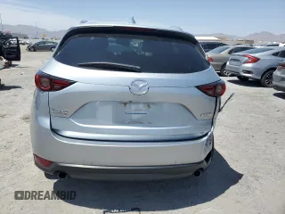 2018 Mazda CX-5 Grand Touring with VIN JM3KFBDM0J0377243, listed as a Copart auction lot 62199295 with 37,930 mi miles and Salvage title. Bid and sale history available at DreamBid. Image 6.