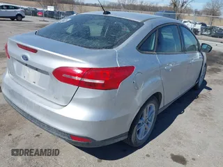 2018 Ford Focus SE with VIN 1FADP3F23JL315341, listed as a IAAI auction lot 41834939 with 121,686 mi miles. Bid and sale history available at carsss.com. Image 4.