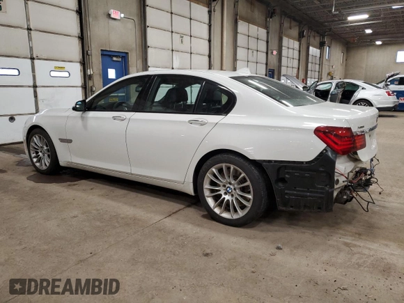 2015 BMW 7 Series 750i xDrive with VIN WBAYB6C54FD965787, listed as a Copart auction lot 89061355 with 104,633 mi miles and Salvage Title. Bid and sale history available at carsss.com. Image 2.