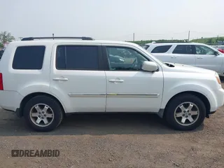 2011 Honda Pilot Touring z VIN 5FNYF4H9XBB003469, wystawiony jako IAAI lot #42369323 z przebiegiem 201 958 mil mil oraz . Historia ofert i sprzedaży dostępna na DreamBid. Obrazek 13.