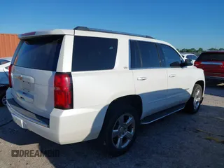 2016 Chevrolet Tahoe LTZ with VIN 1GNSKCKC0GR203348, listed as a IAAI auction lot 42220438 with 108,657 mi miles and . Bid and sale history available at DreamBid. Image 4.
