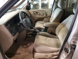 2002 Mazda Tribute LX with VIN 4F2CU08172KM40111, listed as a Copart auction lot 47141754 with 131,324 mi miles and Non Repairable. Bid and sale history available at carsss.com. Image 7.