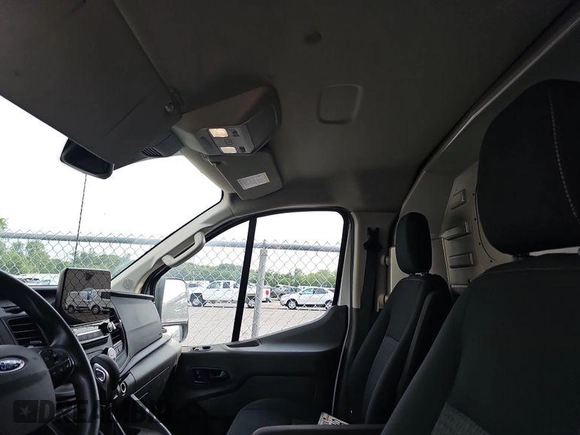 2021 Ford Transit Cargo with VIN 1FTBR2YG3MKA85227, listed as a IAAI auction lot 42678741 with 122,360 mi miles and . Bid and sale history available at DreamBid. Image 20.