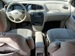 2003 Ford Windstar LX with VIN 2FMZA51413BB77562, listed as a Copart auction lot 56861095 with 170,562 mi miles and Salvage title. Bid and sale history available at DreamBid. Image 8.