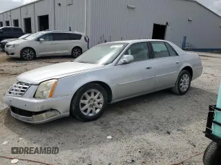 2011 Cadillac DTS Premium Collection z VIN 1G6KH5E69BU137044, wystawiony jako Copart lot #54723905 z przebiegiem 128 081 mil mil oraz Szkody całkowita. Historia ofert i sprzedaży dostępna na DreamBid. Obrazek 1.