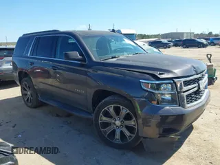 2015 Chevrolet Tahoe LT with VIN 1GNSCBKC7FR636297, listed as a IAAI auction lot 41683259 with 163,011 mi miles and . Bid and sale history available at DreamBid. Image 1.