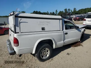 2004 Dodge Dakota with VIN 1D7FL16K14S554387, listed as a Copart auction lot 59397994 with 0 mi miles and Salvage Title. Bid and sale history available at carsss.com. Image 3.