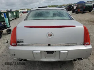 2011 Cadillac DTS Premium Collection z VIN 1G6KH5E69BU137044, wystawiony jako Copart lot #54723905 z przebiegiem 128 081 mil mil oraz Szkody całkowita. Historia ofert i sprzedaży dostępna na DreamBid. Obrazek 6.