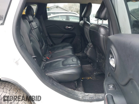 2016 Jeep Cherokee Trailhawk with VIN 1C4PJMBS7GW241076, listed as a IAAI auction lot 42020124 with 151,742 mi miles and . Bid and sale history available at DreamBid. Image 8.