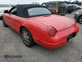 2003 Ford Thunderbird Deluxe z VIN 1FAHP60A43Y111849, wystawiony jako Copart lot #76742564 z przebiegiem Nie podano mil oraz Szkoda całkowita • Salvage title. Historia ofert i sprzedaży dostępna na DreamBid. Obrazek 2.